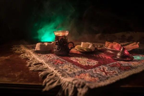 صورة تحتوي على سجادة و كوب جلب الحبيب برقم الهاتف